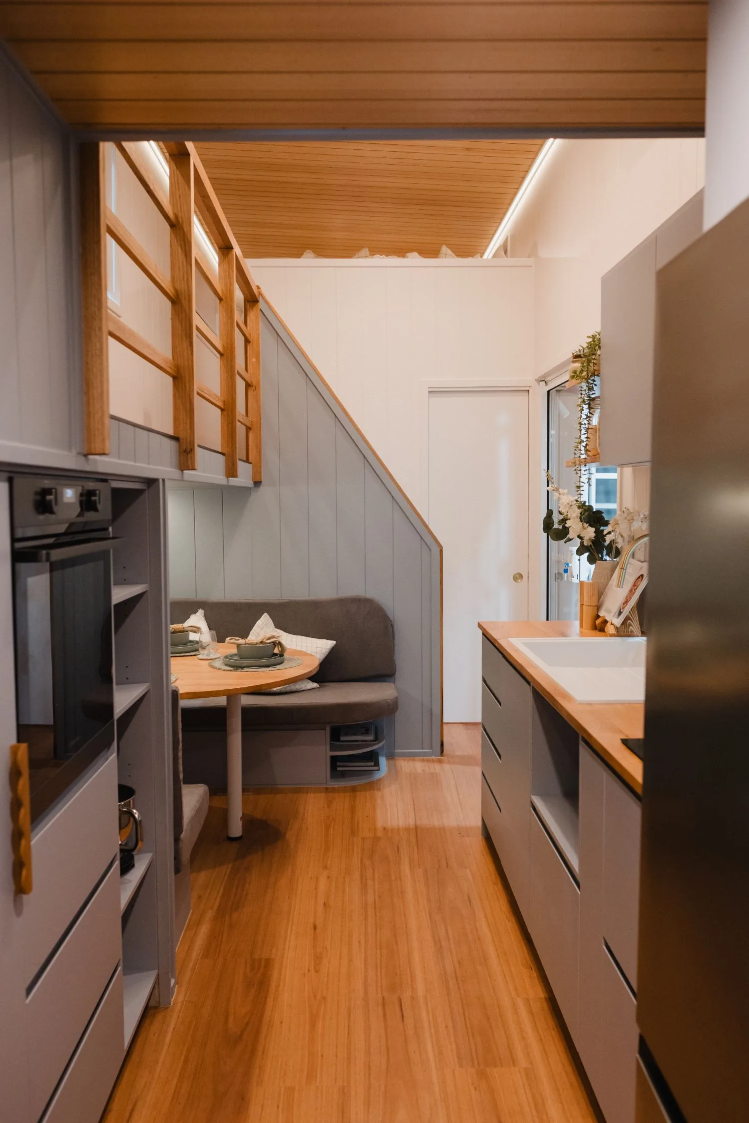 Serenity galley kitchen and dining looking toward the loft stair