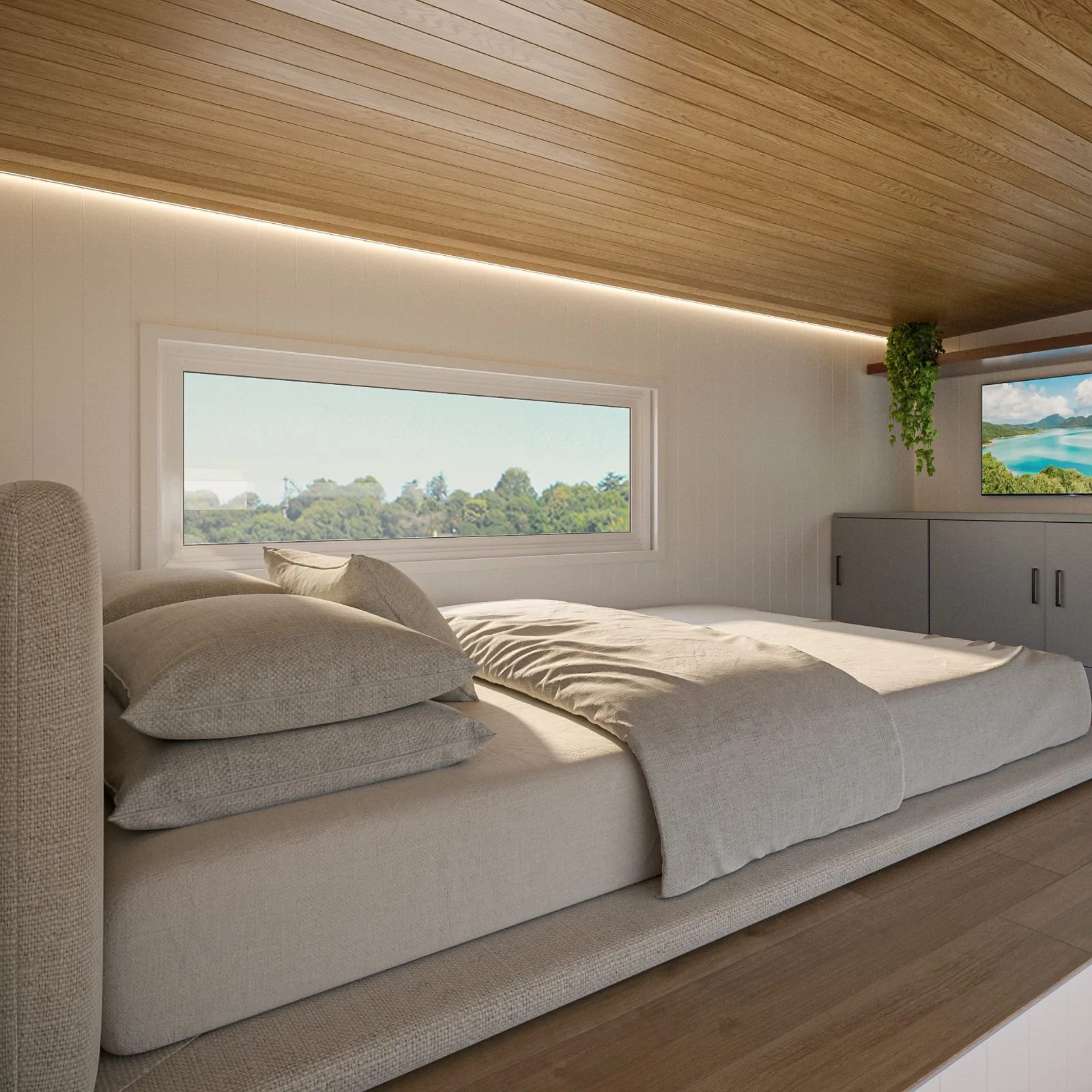 Serenity interior: galley kitchen, dining nook by the window and loft above