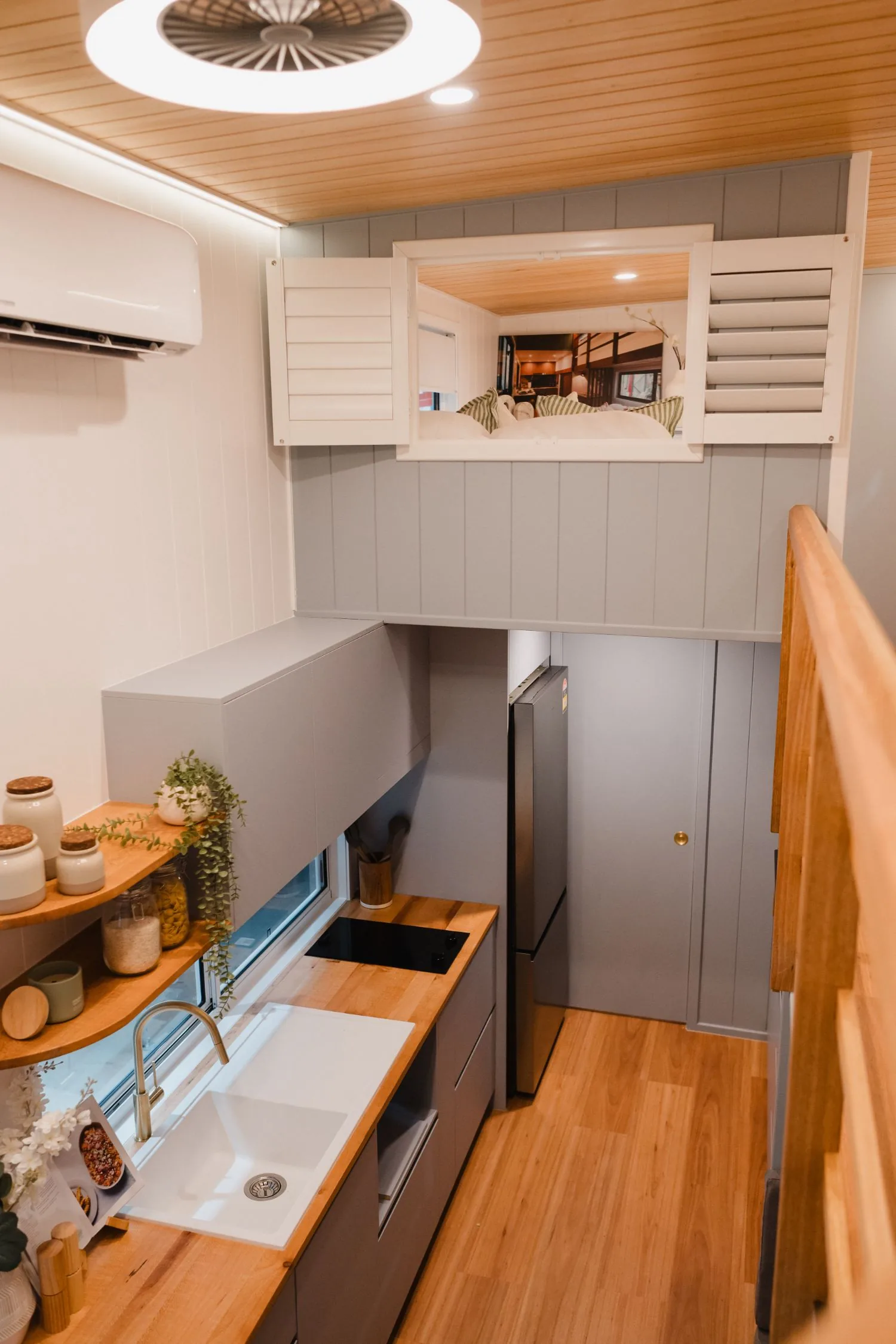 View from the Serenity loft down over the kitchen and fridge